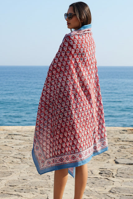 red and blue block print pattered cotton pareo sarong. 