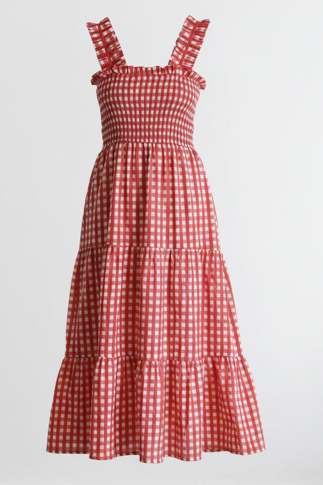 Red and white checkered dress on a light gray background