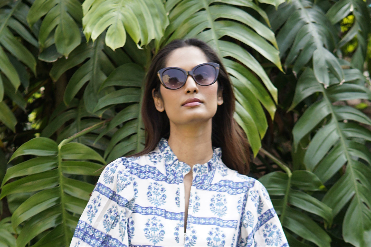 woman wearing pie crust collar day dress in blue and white Indian cotton