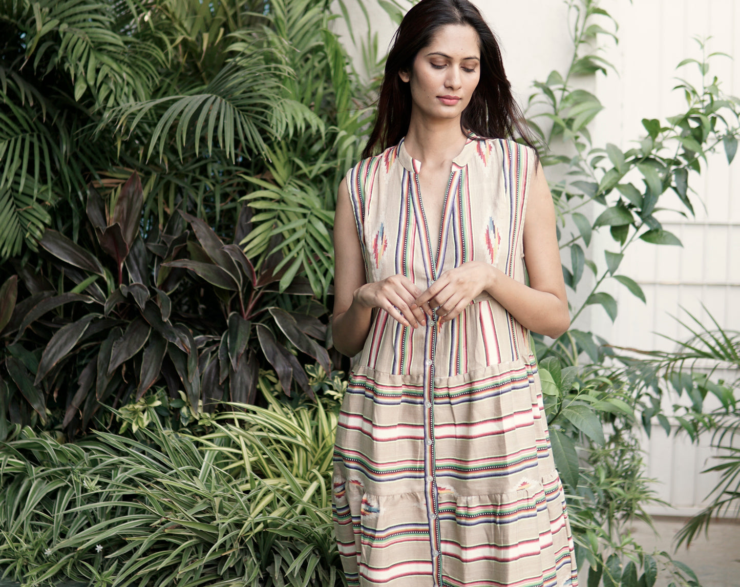 This is the most wonderful, completely hand made, summer maxi dress. The handloom cotton is so rich and completely authentic. The beige, white, green and pink Navaho style handwoven pattern is complemented by the great tiered shape.